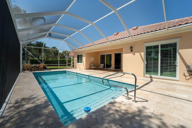3352 SE Cascadia Way, Hobe Sound, FL 33455 - outdoor pool featuring a patio and glass enclosure