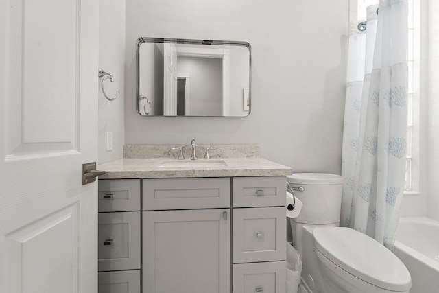 3352 SE Cascadia Way, Hobe Sound, FL 33455 - bathroom with toilet, shower / bath combo with shower curtain, and vanity