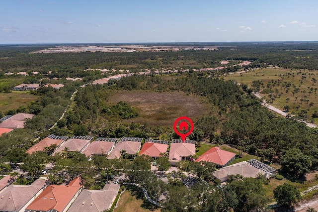 3352 SE Cascadia Way, Hobe Sound, FL 33455 - aerial view featuring a view of trees and a residential view