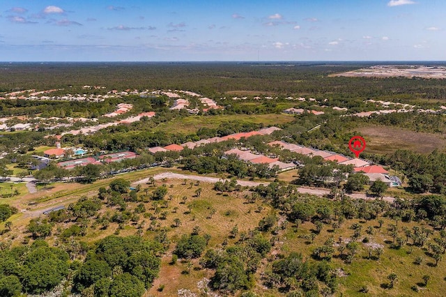 3352 SE Cascadia Way, Hobe Sound, FL 33455 - birds eye view of property with a forest view