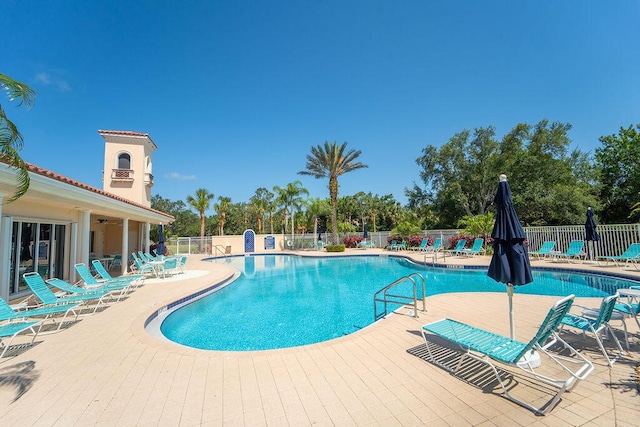 3352 SE Cascadia Way, Hobe Sound, FL 33455 - community pool featuring fence and a patio