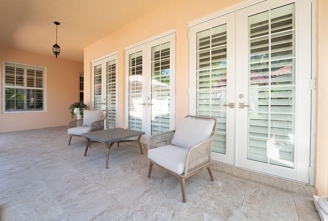 3352 SE Cascadia Way, Hobe Sound, FL 33455 - view of patio / terrace featuring french doors