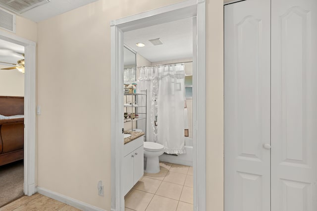 full bath featuring toilet, tile patterned floors, visible vents, ceiling fan, and vanity