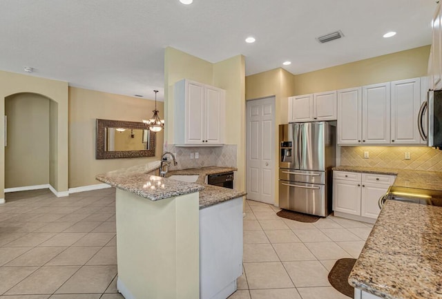 7562 Starfish Reef Ln, Lake Worth, FL 33467 - kitchen featuring appliances with stainless steel finishes, a sink, a peninsula, light tile patterned floors, and recessed lighting