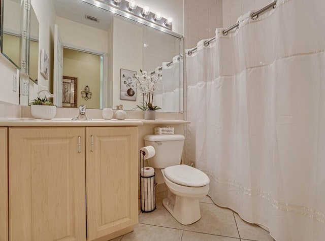 7562 Starfish Reef Ln, Lake Worth, FL 33467 - bathroom with tile patterned flooring, toilet, vanity, and curtained shower