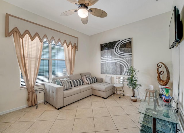 7562 Starfish Reef Ln, Lake Worth, FL 33467 - living room featuring a ceiling fan, light tile patterned floors, and baseboards