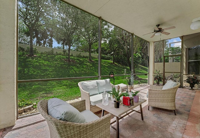 7562 Starfish Reef Ln, Lake Worth, FL 33467 - sunroom featuring a ceiling fan and outdoor lounge area
