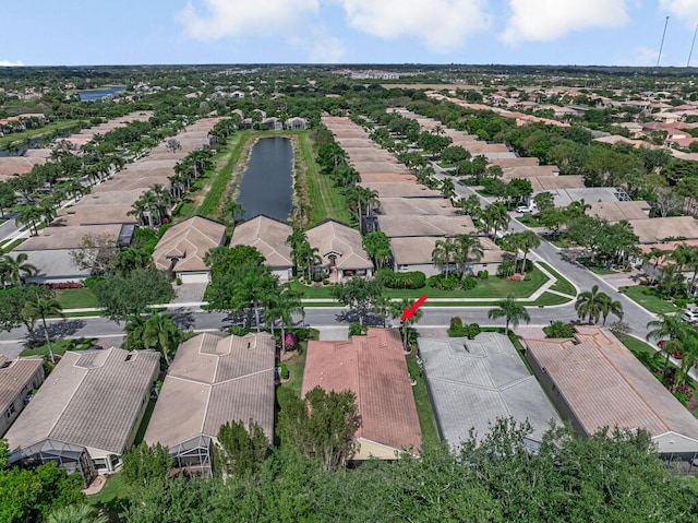 7562 Starfish Reef Ln, Lake Worth, FL 33467 - aerial view of property's location with nearby suburban area and a nearby body of water