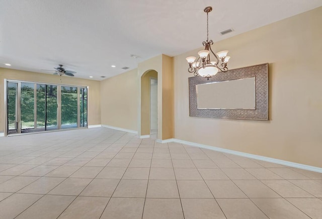 7562 Starfish Reef Ln, Lake Worth, FL 33467 - unfurnished room with arched walkways, a chandelier, baseboards, ceiling fan, and recessed lighting