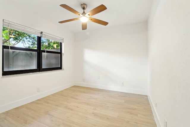 3107 SW 20th Ter Unit C-1, Delray Beach, FL 33445 - empty room featuring ceiling fan, light wood-style floors, and baseboards