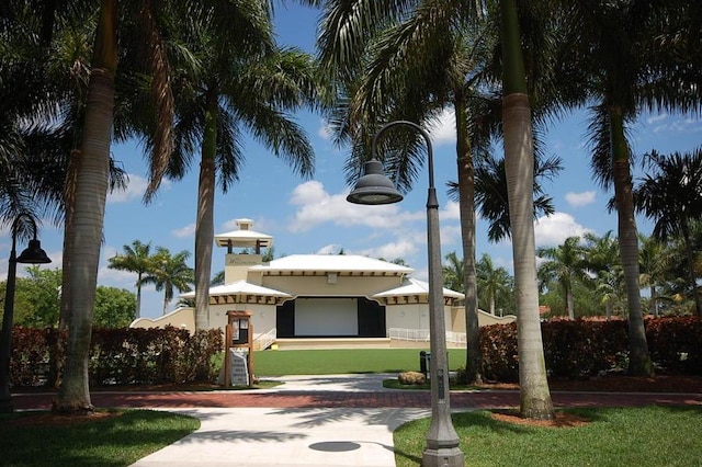 582 Cypress Green Cir, Wellington, FL 33414 - view of front of home with stucco siding and a front lawn