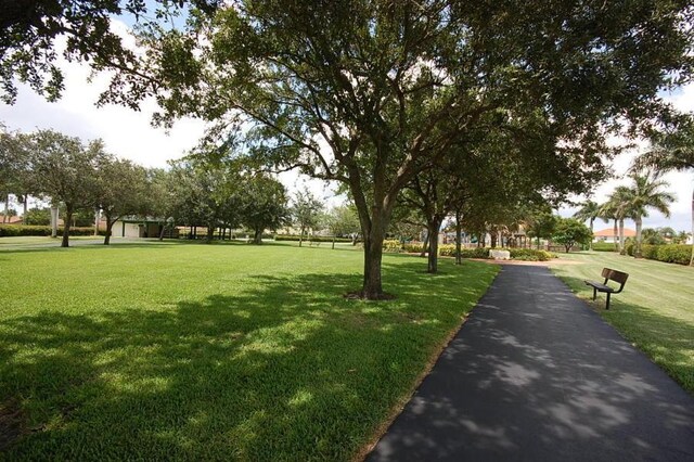 582 Cypress Green Cir, Wellington, FL 33414 - surrounding community featuring a yard