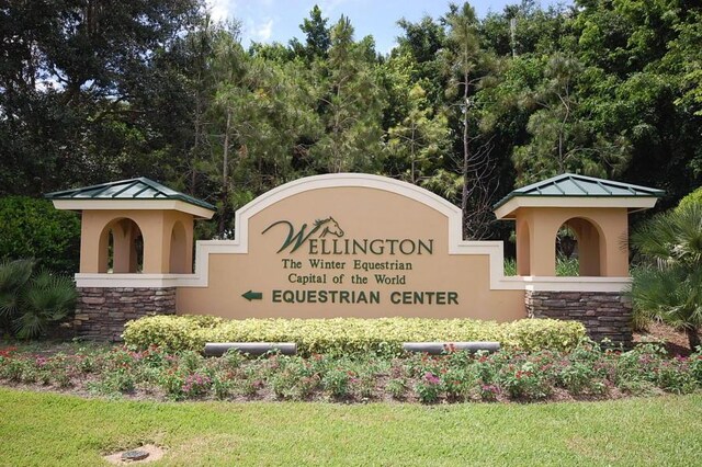 582 Cypress Green Cir, Wellington, FL 33414 - community sign featuring a lawn