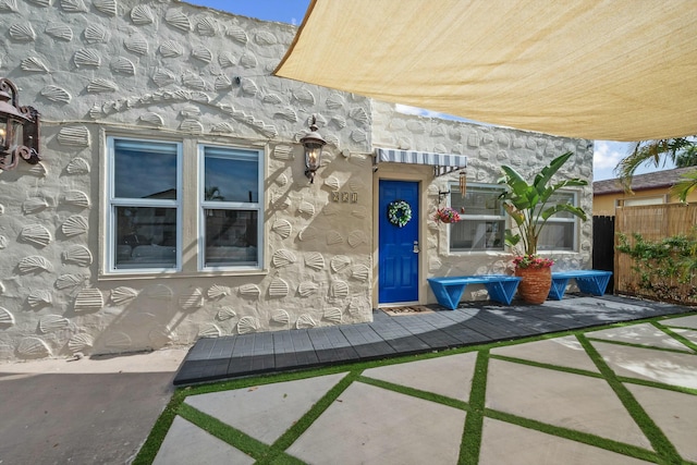 951 Selkirk St, West Palm Beach, FL 33405 - entrance to property with fence and stone siding