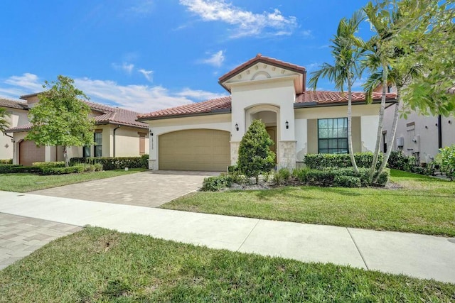 12170 N Baypoint Cir, Parkland, FL 33076 - mediterranean / spanish house featuring a tile roof, a front lawn, a garage, driveway, and stucco siding