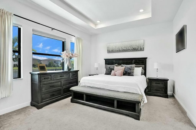 12170 N Baypoint Cir, Parkland, FL 33076 - bedroom with recessed lighting, a raised ceiling, light colored carpet, and baseboards