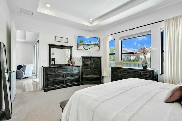 12170 N Baypoint Cir, Parkland, FL 33076 - carpeted bedroom featuring a raised ceiling, visible vents, and recessed lighting