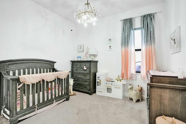 12170 N Baypoint Cir, Parkland, FL 33076 - bedroom featuring a crib, an inviting chandelier, and carpet floors