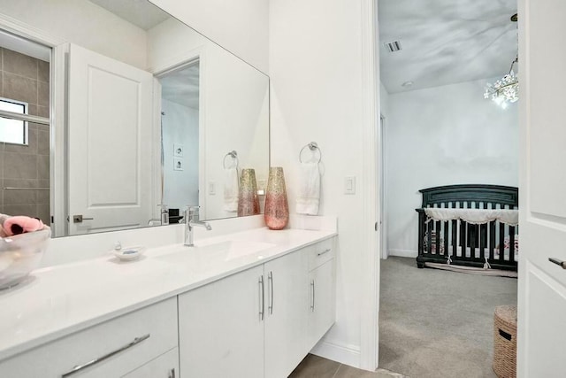 12170 N Baypoint Cir, Parkland, FL 33076 - bathroom featuring visible vents, vanity, and baseboards