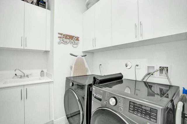 12170 N Baypoint Cir, Parkland, FL 33076 - laundry area with separate washer and dryer, cabinet space, and a sink