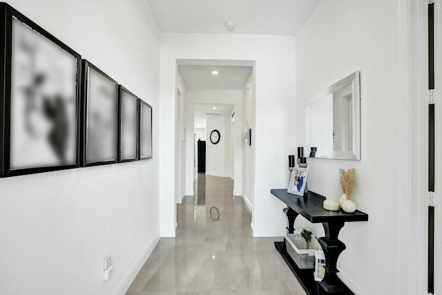 12170 N Baypoint Cir, Parkland, FL 33076 - corridor featuring recessed lighting, marble finish floor, and baseboards