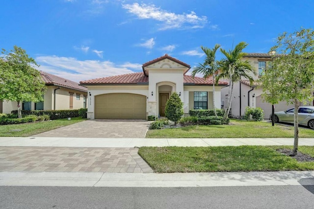 12170 N Baypoint Cir, Parkland, FL 33076 - mediterranean / spanish-style house with a tile roof, a front yard, an attached garage, decorative driveway, and stucco siding