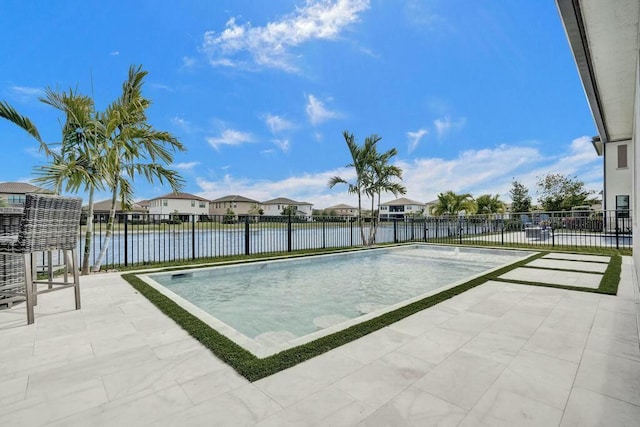 12170 N Baypoint Cir, Parkland, FL 33076 - view of pool featuring a patio area, a residential view, a fenced in pool, a water view, and fence