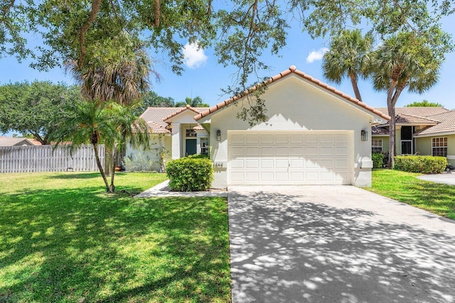 3803 S Lancewood Pl, Delray Beach, FL 33445 - view of front of property with a tiled roof, driveway, fence, an attached garage, and stucco siding