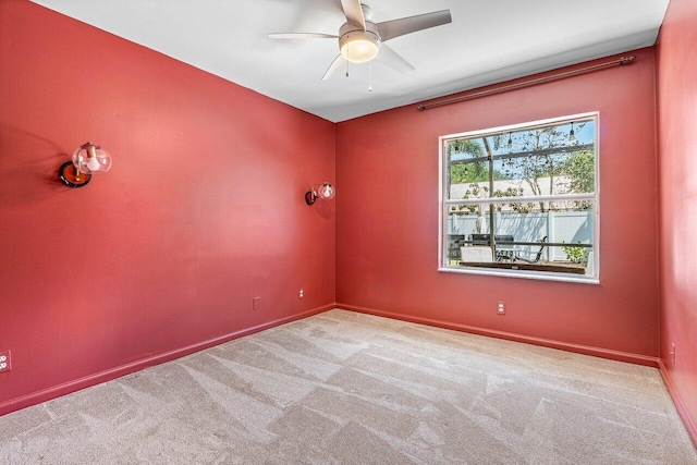 3803 S Lancewood Pl, Delray Beach, FL 33445 - spare room featuring baseboards, a ceiling fan, and carpet