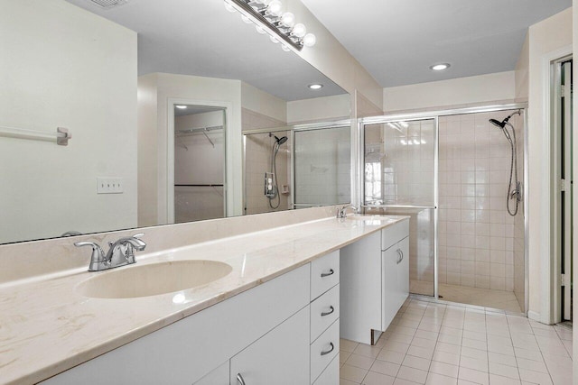 3803 S Lancewood Pl, Delray Beach, FL 33445 - full bath featuring a sink, tile patterned floors, a shower stall, and double vanity