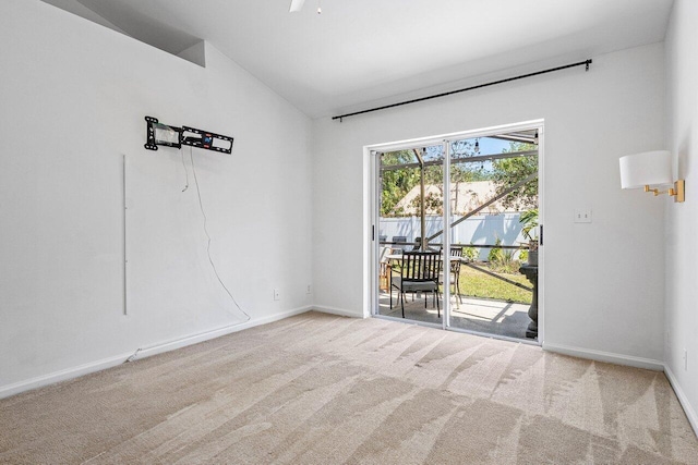 3803 S Lancewood Pl, Delray Beach, FL 33445 - unfurnished room featuring carpet floors, baseboards, and lofted ceiling