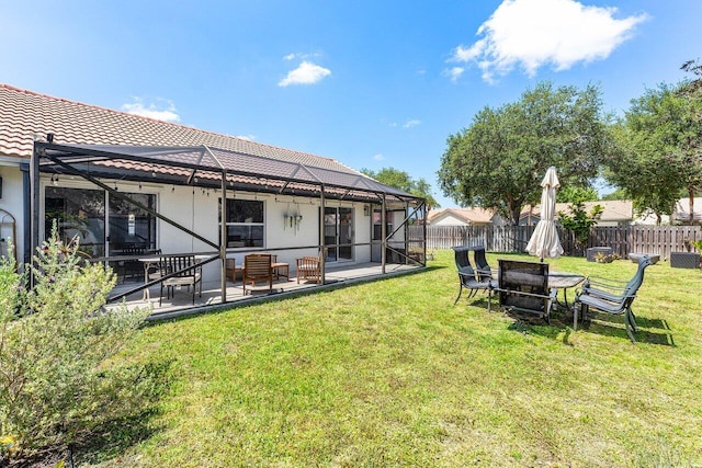 3803 S Lancewood Pl, Delray Beach, FL 33445 - view of yard with fence, a lanai, and a patio area