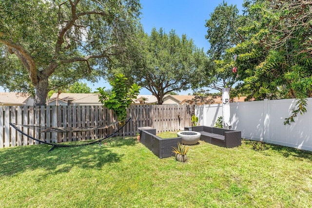 3803 S Lancewood Pl, Delray Beach, FL 33445 - view of yard with an outdoor living space and a fenced backyard