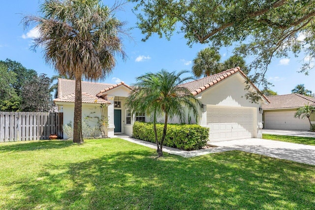 3803 S Lancewood Pl, Delray Beach, FL 33445 - mediterranean / spanish house featuring fence, a tile roof, a front lawn, stucco siding, and concrete driveway