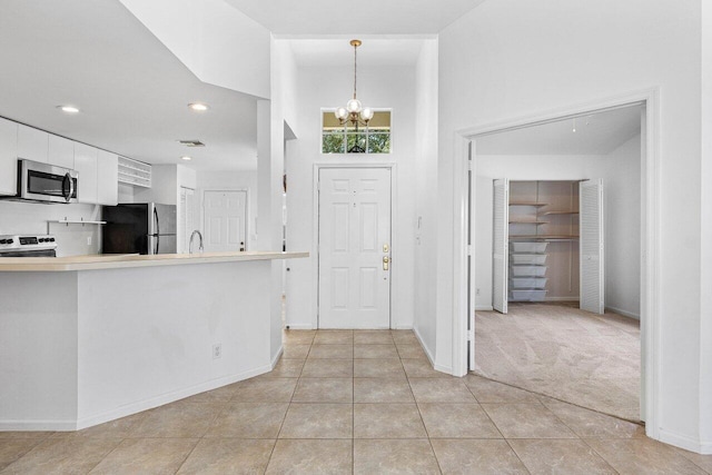 3803 S Lancewood Pl, Delray Beach, FL 33445 - foyer with visible vents, baseboards, recessed lighting, a chandelier, and light tile patterned floors