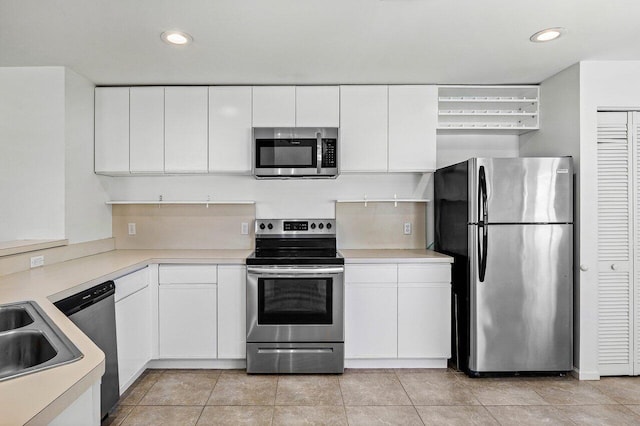 3803 S Lancewood Pl, Delray Beach, FL 33445 - kitchen featuring white cabinets, recessed lighting, and appliances with stainless steel finishes
