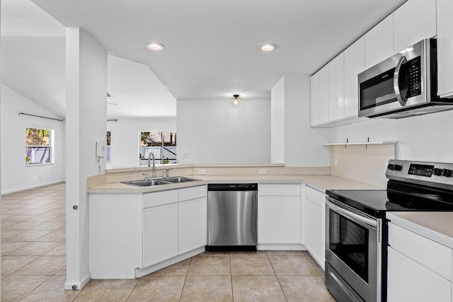 3803 S Lancewood Pl, Delray Beach, FL 33445 - kitchen with a sink, appliances with stainless steel finishes, light tile patterned floors, and light countertops
