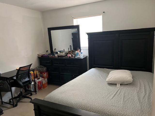 1164 NW 45th Ave, Lauderhill, FL 33313 - bedroom with light carpet