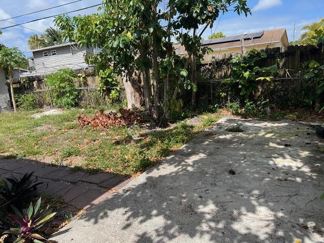 1164 NW 45th Ave, Lauderhill, FL 33313 - view of yard with a patio area and fence