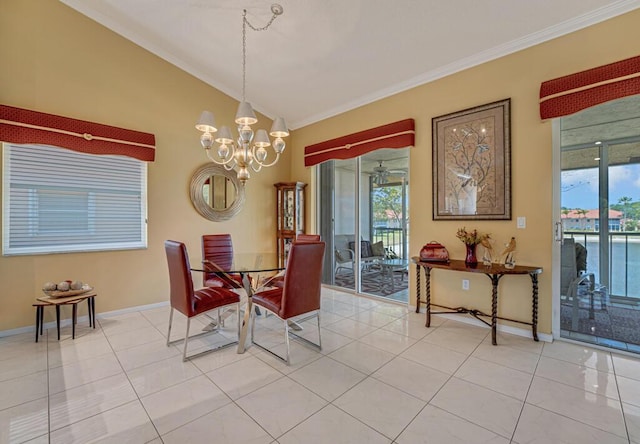 dining room featuring baseboards, a notable chandelier, ornamental molding, and lofted ceiling