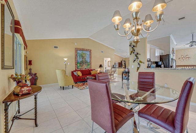 dining space featuring visible vents, ornamental molding, and vaulted ceiling