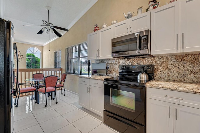 kitchen with crown molding, ceiling fan, black appliances, and tasteful backsplash