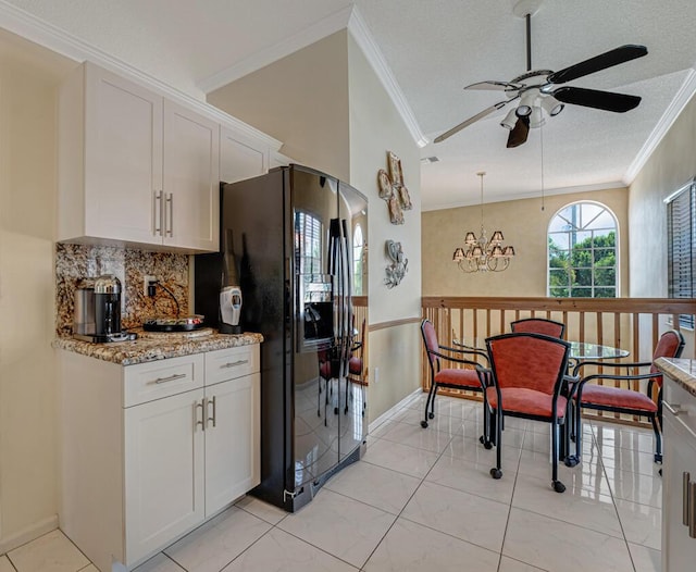 kitchen with decorative backsplash, ceiling fan, crown molding, black refrigerator with ice dispenser, and white cabinetry