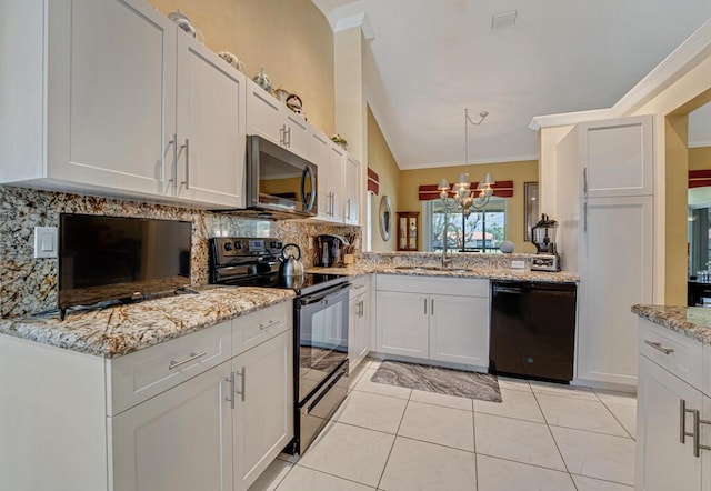kitchen with decorative backsplash, vaulted ceiling, a sink, black appliances, and an inviting chandelier
