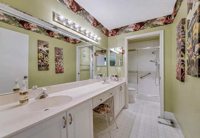 full bathroom with a sink, tile patterned flooring, a stall shower, and double vanity