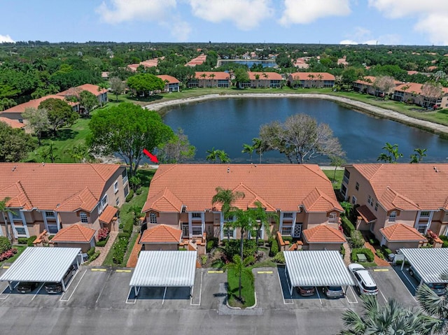 birds eye view of property featuring a residential view and a water view