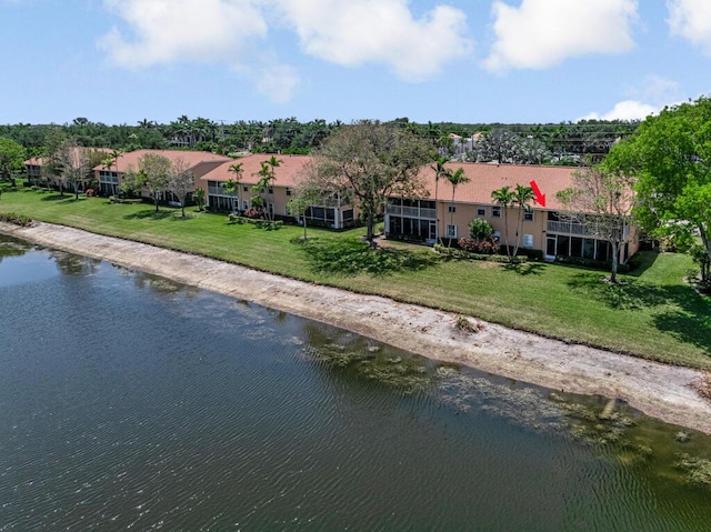 drone / aerial view with a water view