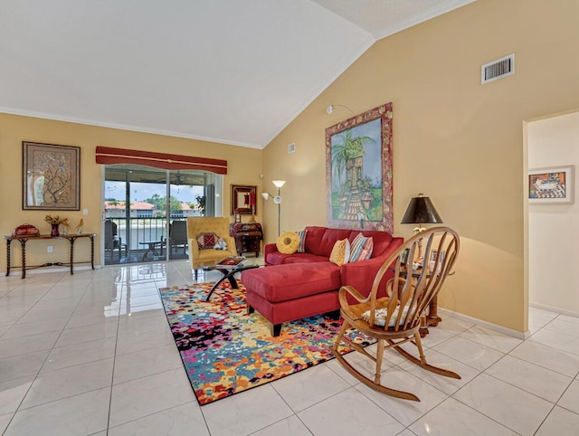 living area featuring visible vents, ornamental molding, light tile patterned floors, and lofted ceiling