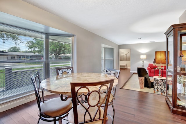 621 NW 71st Ave, Plantation, FL 33317 - dining area featuring wood finished floors and baseboards