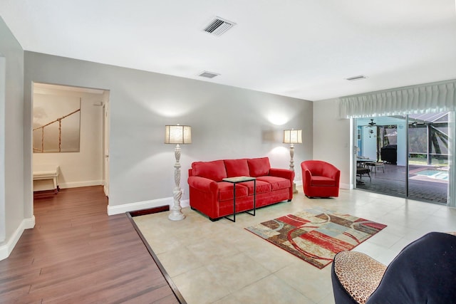 621 NW 71st Ave, Plantation, FL 33317 - living area featuring baseboards and wood finished floors